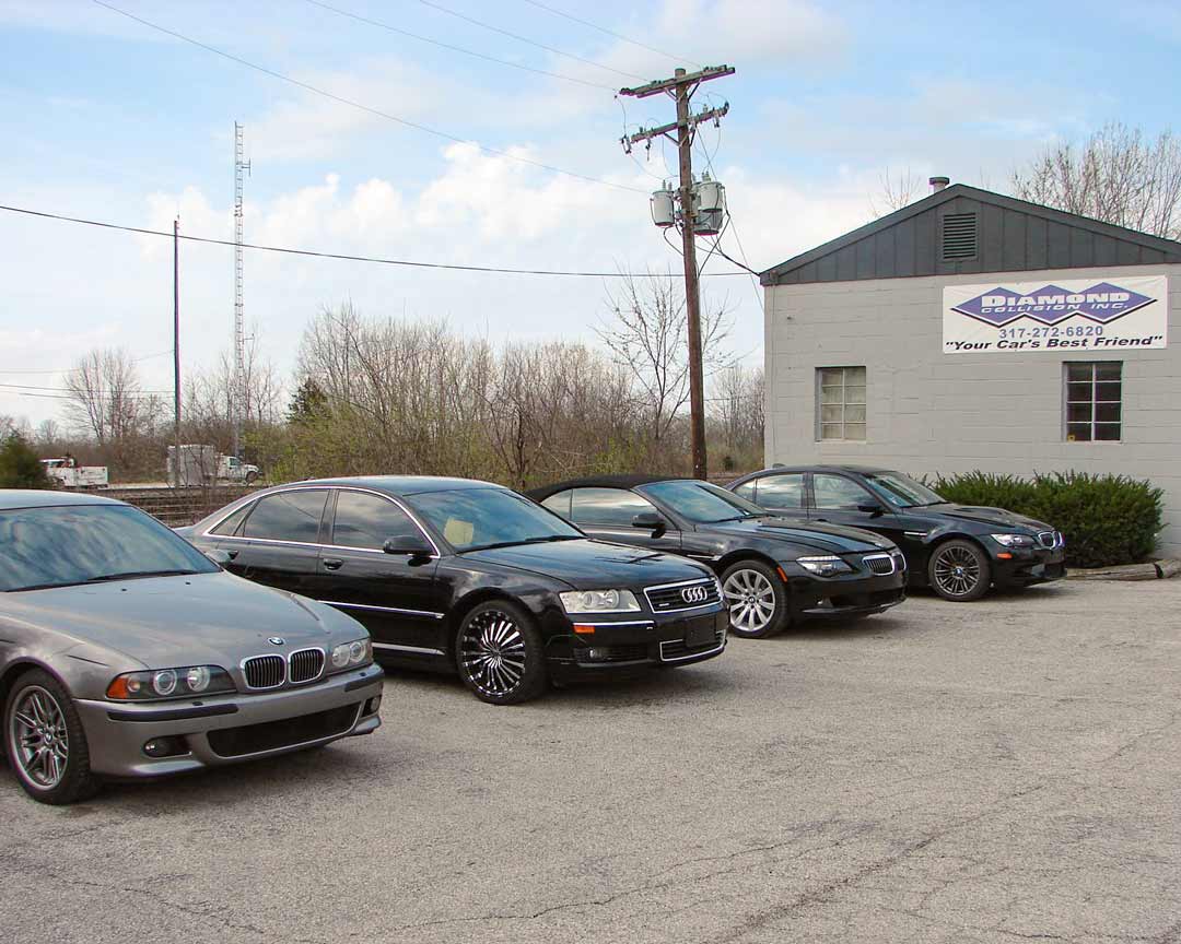 Cars outside the shop of Diamond Collision Inc in Avon IN.