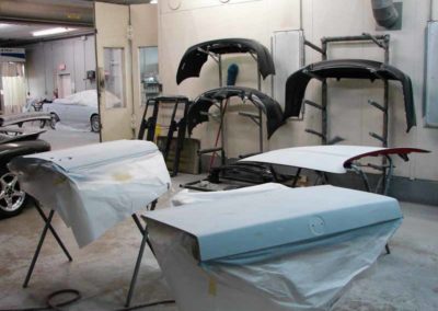 1993 BMW 325i convertible E30 doors and hood being painted at Diamond Collision Services Inc.